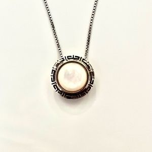 Sterling silver greek key symbol pendant with mother of pearl